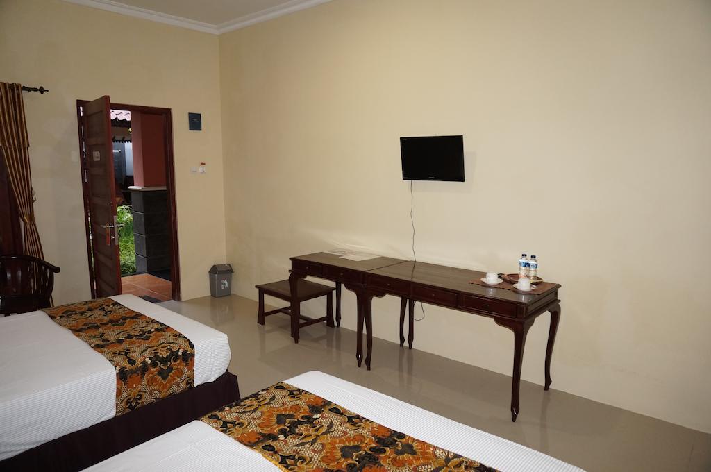 3C Familia Residence Jogjacarta Quarto foto